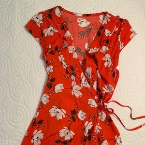 Garage orange floral wrap romper
